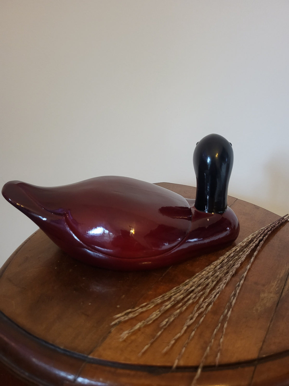 Canard en bois laqué