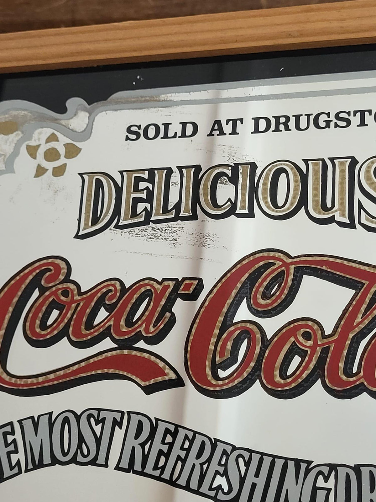 Miroir publicitaire Coca Cola